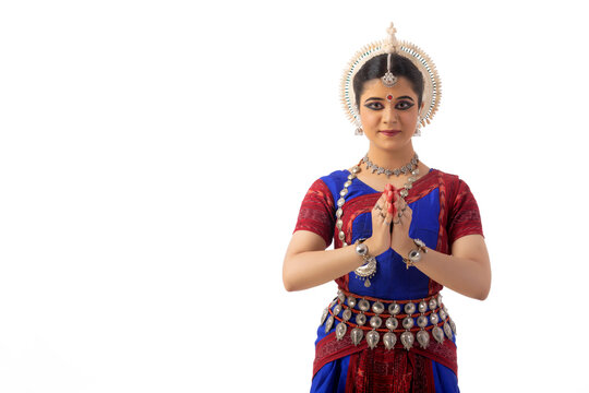 Odissi dancer performing anjali mudra