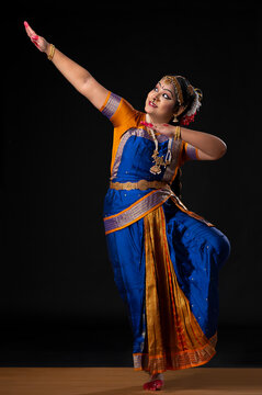 Indian classical dancer performing kuchipudi on stage