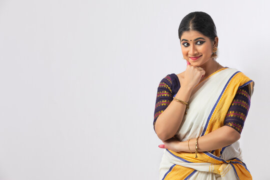 Mohiniattam dancer remembering a pleasing incident through Mushti mudra 