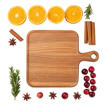 Wooden cutting board mock up with fresh orange slices cranberries cinnamon rosemary star anise