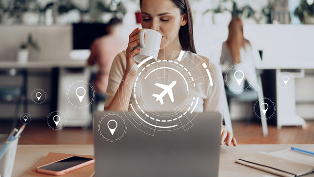 Travel booking process for trips with online tools in a busy cafe during a weekday afternoon