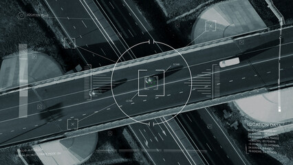 Naklejka premium Surveillance system shows vehicles on road with tracking data displayed on screen