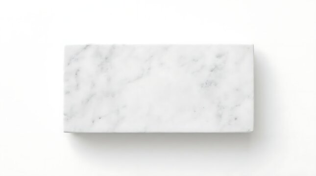 Rectangular white marble block on plain background.