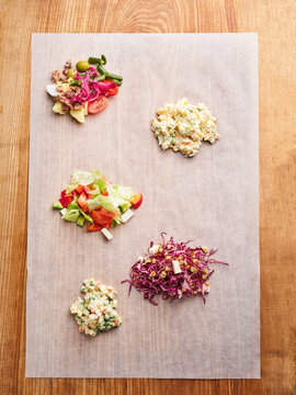 Colorful fresh vegetable salad ingredients arranged for meal prep, healthy eating concept for packaging and recipe blogs