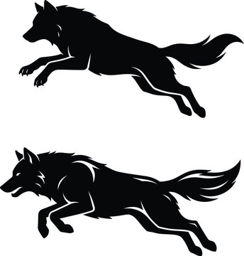 Black silhouette of two jumping wolves