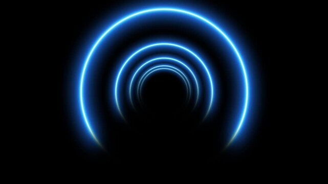 A perspective view of a dark tunnel formed by concentric glowing blue neon rings receding into the distance, creating a sense of depth and futuristic motion. Keywords: blue, neon, rings, tunnel