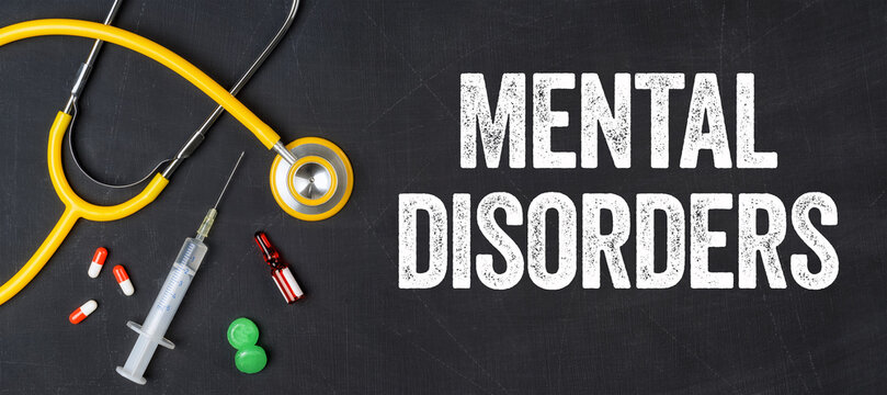 Stethoscope and pharmaceuticals on a blackboard - Mental disorders