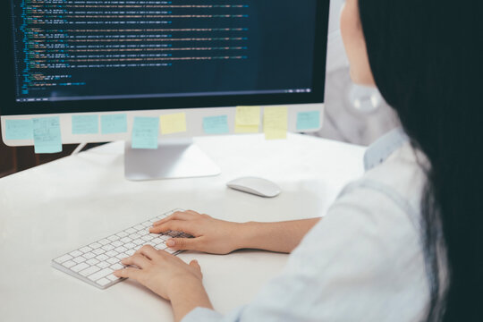 Programmer is coding and programming software