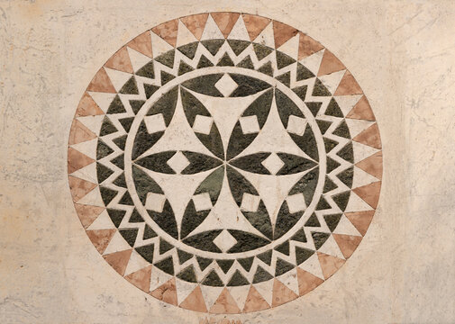 LUCCA, ITALY - JUNE 23, 2026: The detail of medieval marble geometric symbolic, intarsia of church Cattedrale di San Martino by unknown artist (1210 &ndash; 1230). 