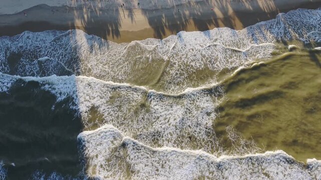 Vietnam, Da Nang Aerial Surf Over Da Nang Shoreline, Powerful Emerald Waves Carving Foamy Lines, Palm Shadow Silhouettes On Wet Sand, Dynamic Motion And Texture Ideal For Coastal Nature