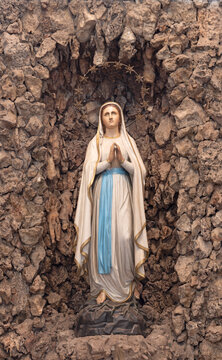 PISA, ITALY - JUNE 22, 2026: The statue of Virgin Mary of Lourde in the church Chiesa di San Frediano by unknown artist. 