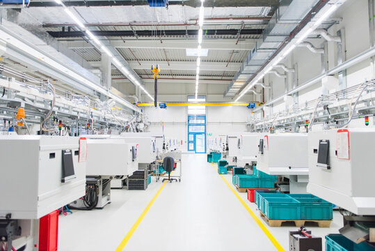 Machinery in empty factory shop floor