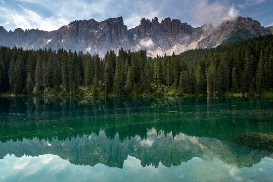 Italy, South Tyrol, Lake Karersee and Latemar group