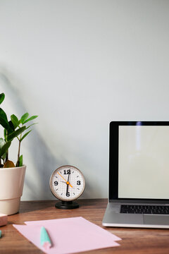 Desk with retro clock at home office