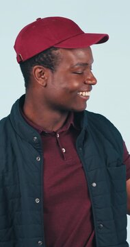 Courier, presentation and man in studio with face for options, pointing or gesture with smile for info. Details, menu or list with happy black person, delivery steps or advertising on background