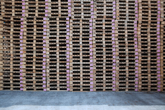 Stacks of pallets on factory yard