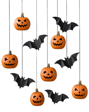 Festive Halloween hanging decorations, smiling carved pumpkins and bats, orange black party decor isolated PNG with Transparent Background