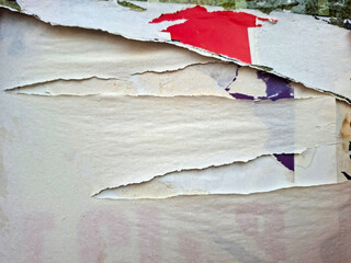 Torn and ripped urban textured paper poster grungy background © DaliCeMedia