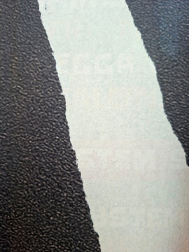 Torn and ripped urban textured paper poster grungy background