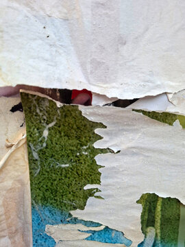 Torn and ripped urban textured paper poster grungy background