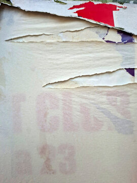 Torn and ripped urban textured paper poster grungy background