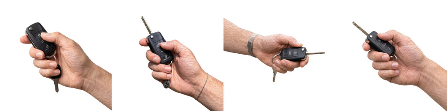 Hand Holding Modern Car Key Fob with Remote Isolated on White Background Stock Photo - Professional Automotive and Transportation Concept Photography