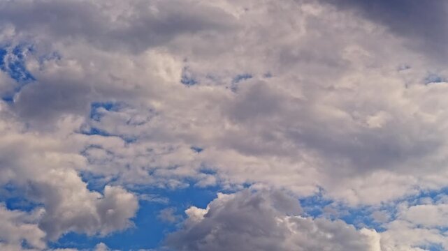 time lapse of clouds and blue sky