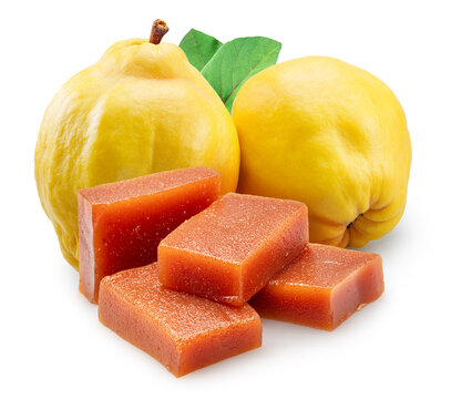 Quince paste cubes and apple quince fruits on white background. File contains clipping paths.