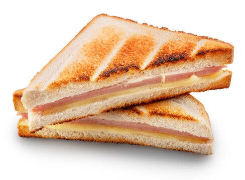 Delicious grilled ham and cheese sandwich cut into triangles and isolated on a white background