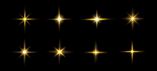 Fototapeta premium Bright star light effect, gold twinkle flare and flashing rays, realistic flash icons isolated on black background.. Glowing starburst elements with halo and glowing beams, sparkling space burst