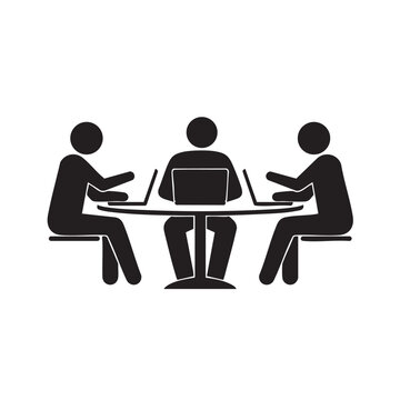 Three people collaborating with laptops at a meeting