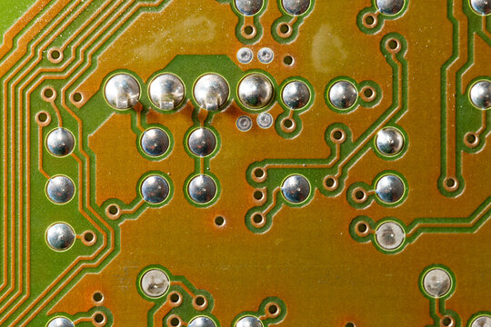 Close up of green electronic computer circuit board as background