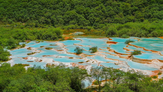 Summer View of Songpan Huanglong colourful travertine pools, Sichuan, China