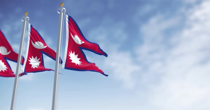 Nepal National flags waving in the wind on a clear day