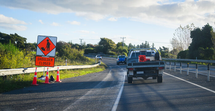 Road work ahead sign along the motorway. State Highway 1. North Island.
