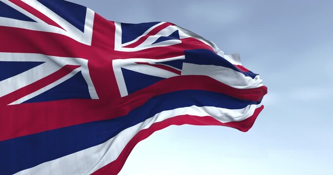 Close up of Hawaii state flag waving on a clear day
