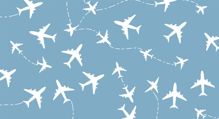 Fototapeta premium Seamless pattern featuring white airplanes flying along dotted flight paths on a light blue background in flat style.