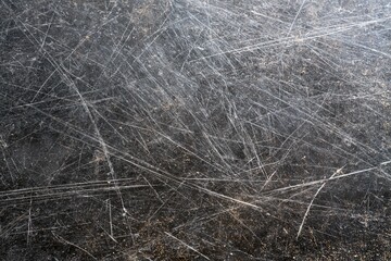 Fototapeta premium The Scratched Metal Surface with Weathered Patina, Dense Lines, and Industrial Texture