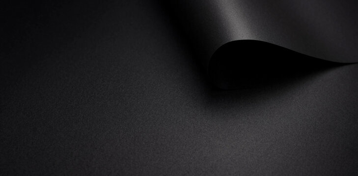 Abstract dark black texture background with soft curved surface edge shadow play shadow effect shadow transition background abstract minimalist material backdrop structure contrast