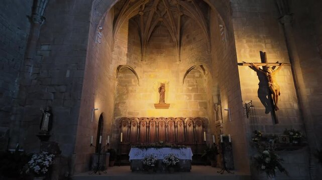 Walking towards altar with casket of Maria in church. Spain.