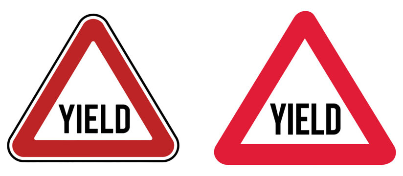 Yield signs featuring bold red triangles and clear black typography indicate traffic safety and road rules.