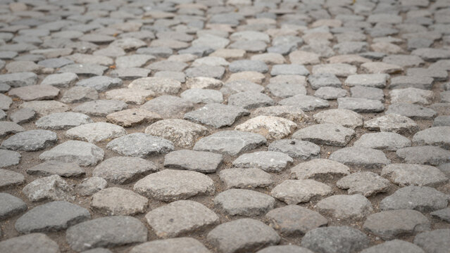 close-up of round cobblestone road texture 