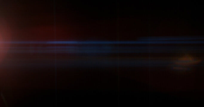 Abstract cinematic anamorphic lens flare overlay with blue horizontal light streaks and warm orange glow on a black background. Ideal VFX element for compositing, titles and film editing.