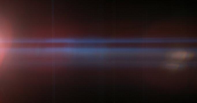 Abstract cinematic anamorphic lens flare overlay with blue horizontal light streaks and warm orange glow on a black background. Ideal VFX element for compositing, titles and film editing.