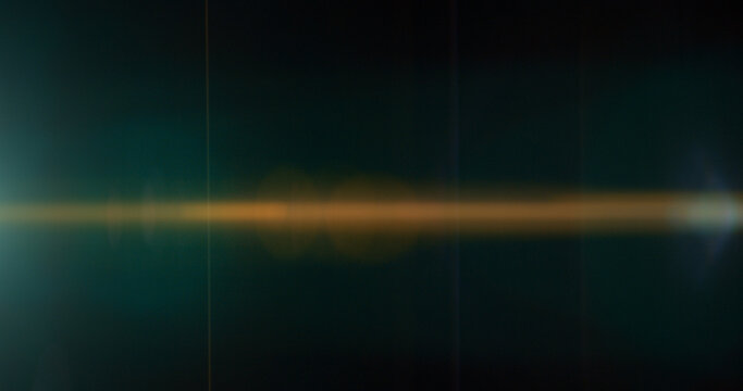 Abstract blue anamorphic lens flare overlay with cinematic horizontal light streak, soft optical glow and dark background. Premium VFX asset for compositing, film editing and motion graphics.