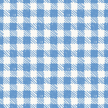 Seamless background pattern with hand drawn blue gingham check plaid texture on white background
