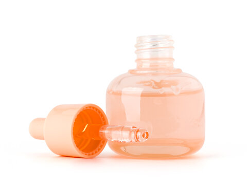 Glass serum bottle with open dropper cap for cosmetic skin care product packaging mockup design