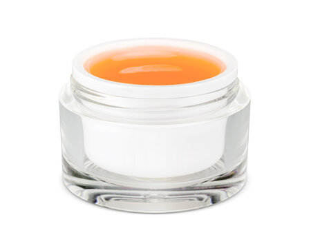 Open glass cosmetic jar mockup with orange gel moisturizer cream for skin care packaging design