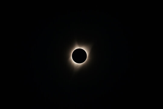 solar eclipse with corona during totality