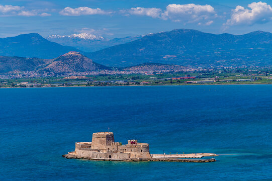 A close up view from the Acronauplia, fortress towards the Bourtzi Castle in Nafplio in Greece in early summertime